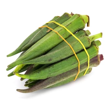 Okra on white background, close up of green vegetable
