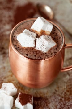 Mug of hot chocolate with star-shaped marshmallows