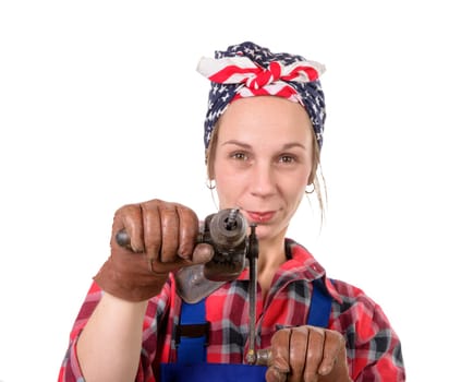 pretty young woman with a old drill on the white background