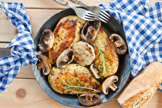 Marinated hate breast with fresh mushrooms