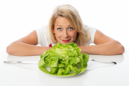 Blonde woman presents a salad head