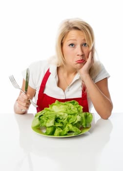 Blonde housewife presents a salad head