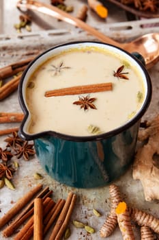 Pot of Indian chai tee / chai latte with a variety of spices