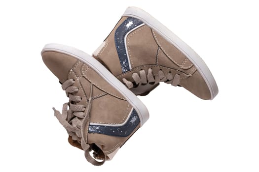 Winter boots and shoes. A pair brown suede winter boots isolated on a white background. Leather shoe fashion new collection winter 2018 to 2019.