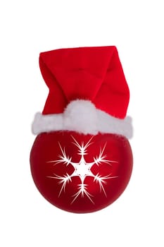 Christmas decorations background. Closeup of a red christmas ball with Santa Claus hat isolated on a white background.