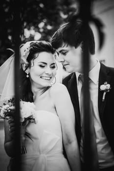 Black white photography beautiful young couple stand on background forest