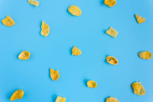 Cornflakes on Blue Pastel Background Minimalist. Cereal Breakfast healthy clean food for food and dessert category