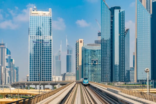 Dubai, UAE - Oct 16, 2018: View of Metro train in downtown Dubai