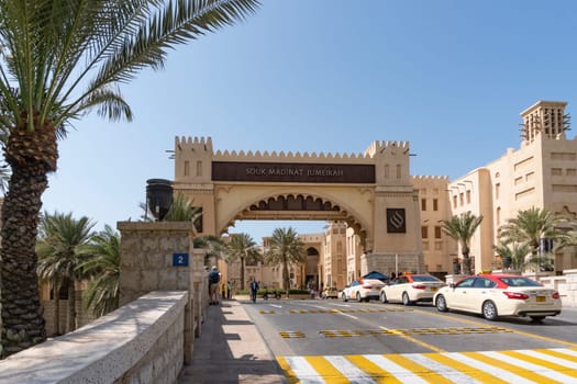 Dubai, UAE - Oct 15, 2018: View of the entrance of Souk Madinat Jumeirah in Dubai. It is a shopping mall with traditional Middle Eastern style.