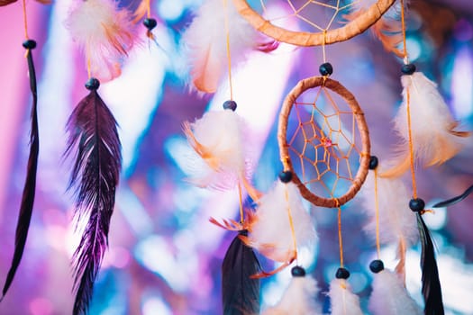 Dream catcher on the bright multicolored background