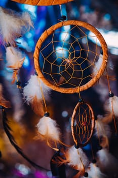 Dream catcher on the bright multicolored background