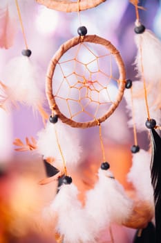 Dream catcher on the bright multicolored background