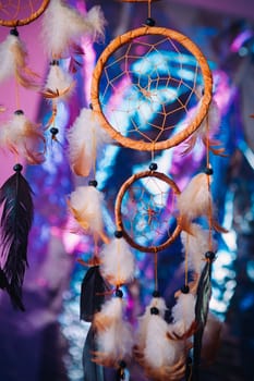 Dream catcher on the bright multicolored background