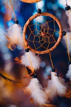 Dream catcher on the bright multicolored background