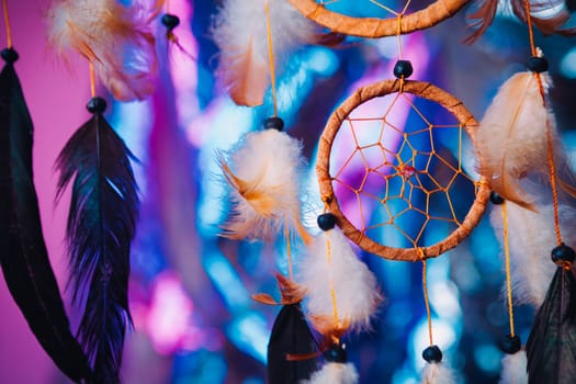 Dream catcher on the bright multicolored background