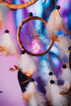 Dream catcher on the bright multicolored background
