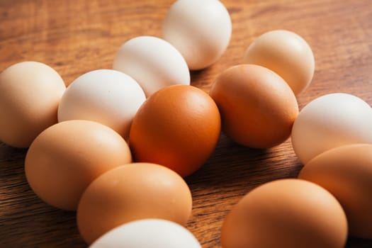 Fresh rural eggs on the wooden background