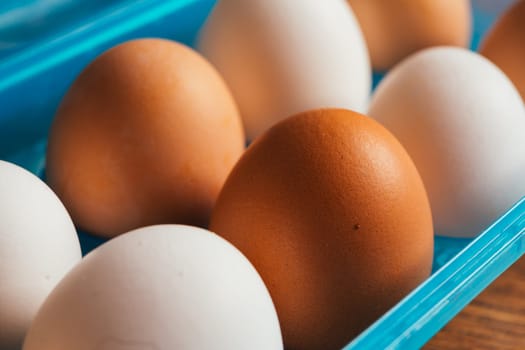 fresh rural eggs in a blue plastic bag