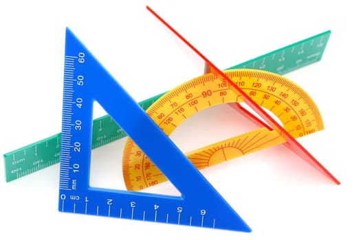 School drawing tools. Triangle, ruler, protractor on white background