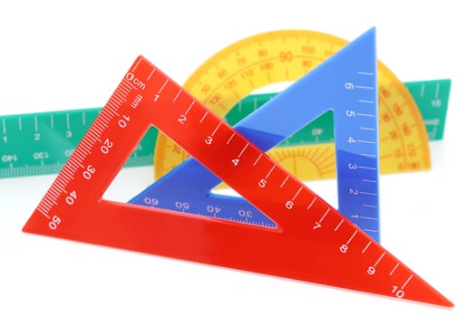 School drawing tools. Triangle, ruler, protractor on white background