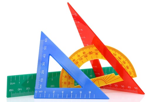 School drawing tools. Triangle, ruler, protractor on white background