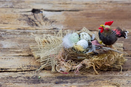 Easter decoration -  eggs in nest and birds