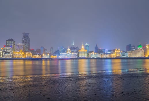 The Bund or Waitan is a waterfront area in central Shanghai.The Bund usually refers to the buildings and wharves on the section of the road, as well as some adjacent areas. It is one of the most famous tourist destinations in Shanghai.