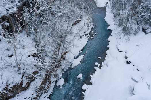 shirahige waterfall located 600 meters above sea leven in the Shirogane hot spring village of Biei City, this waterfall stands more than 30 meters tall. The water flowing down the gaps between the rocks resembles a white beard.