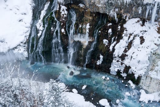shirahige waterfall located 600 meters above sea leven in the Shirogane hot spring village of Biei City, this waterfall stands more than 30 meters tall. The water flowing down the gaps between the rocks resembles a white beard.