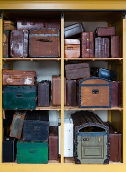 Old suit cases at a train station.