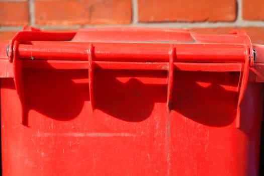 red recycling bin for glass