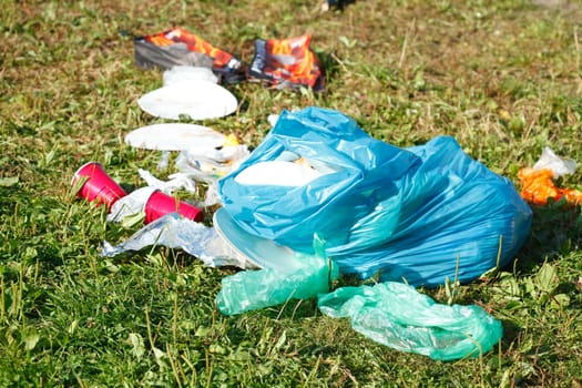 Garbage, rubbish after the Party on a meadow