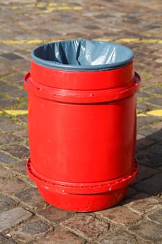 red public garbace can, waste bin
