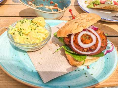 vegetarian lunch vegan burger and potatoes dish