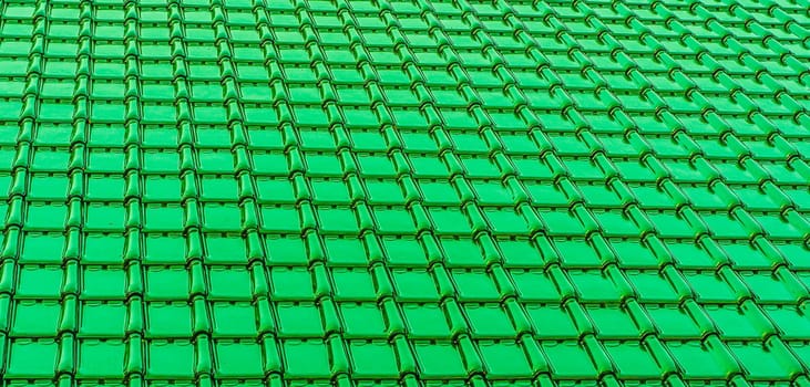 modern deep green glossy rooftop tiling texture background