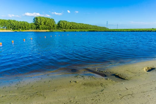 water lake landscape with a sand beach