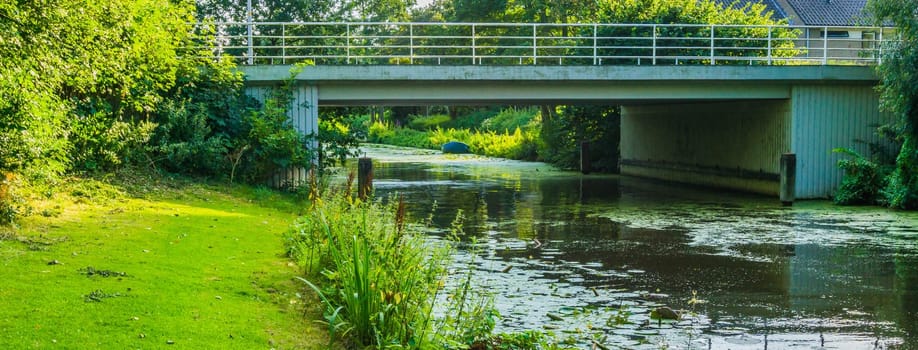 stone water bridge at a river landscape