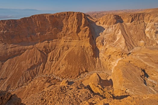 Dry, Eroded Cliffs in the Desert by Masada National Park in Israel