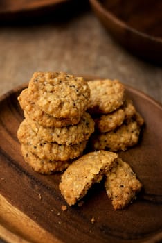 Vegan oatmeal chiaseeds cookies on plate with natural light.