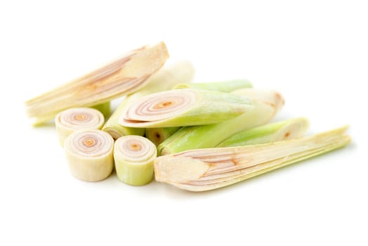 Fresh green lemongrass slices isolated on white background.