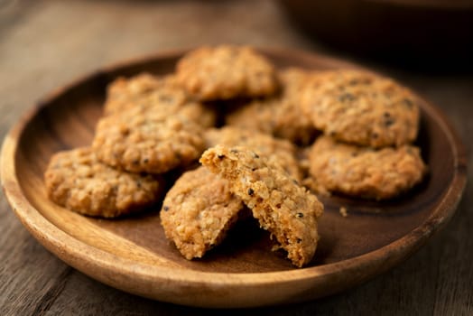 Vegan oatmeal chiaseeds cookies on plate with natural light.