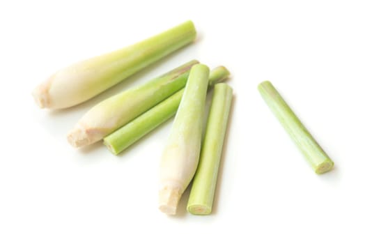 Fresh green lemongrass slices isolated on white background.