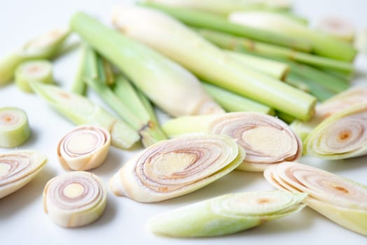 Fresh green lemongrass slices isolated on white background.
