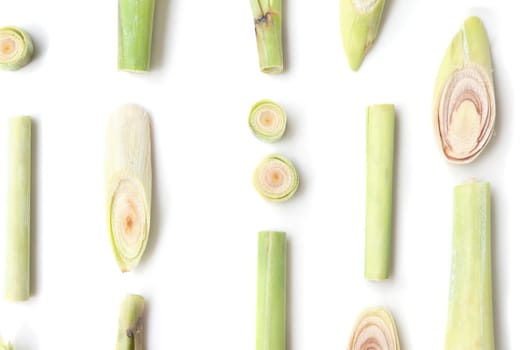 Fresh green lemongrass slices isolated on white background.