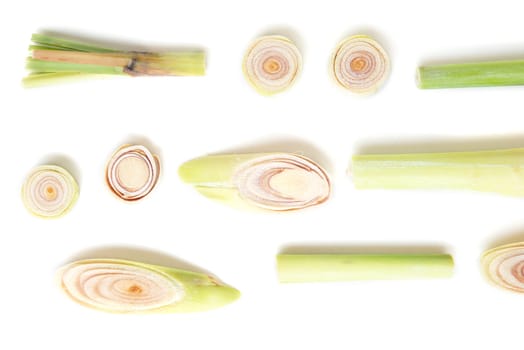 Fresh green lemongrass slices isolated on white background.