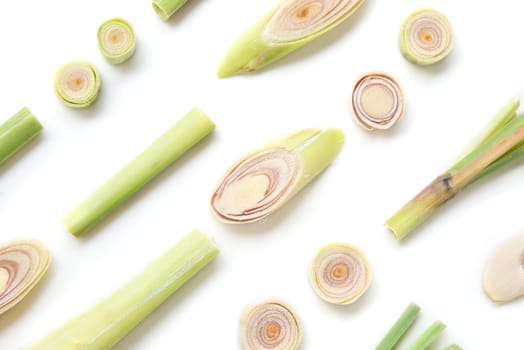 Fresh green lemongrass slices isolated on white background.