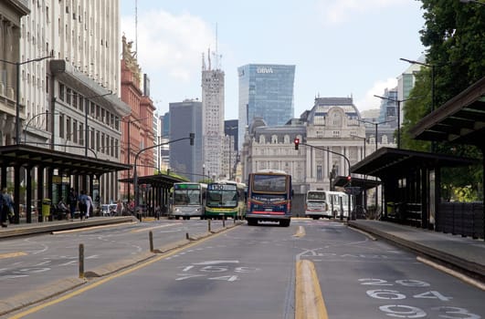 Architecture and buses in Buenos Aires, Argentina. Buenos Aires architecture is characterized by its eclectic nature, with elements resembling Madrid and Paris.