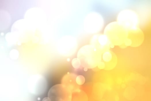 Colorful abstract cloudy pastel colored soft bokeh background. Gradient from gold yellow to white. Space for text.