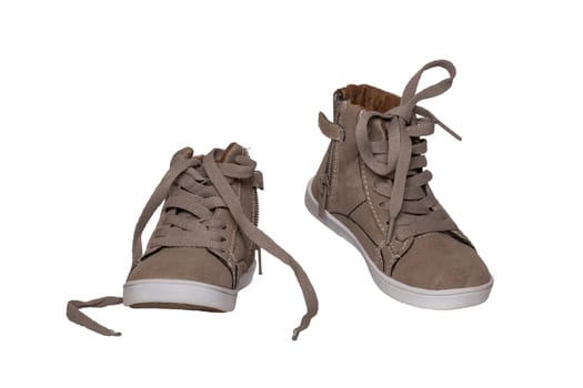 Winter boots and shoes. A pair brown suede winter boots isolated on a white background. Leather shoe fashion new collection winter 2018 to 2019.