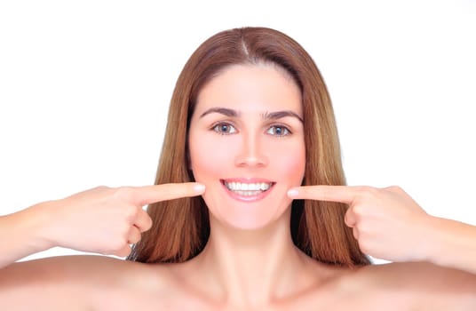 Laughing blond woman winks and holds up her hair